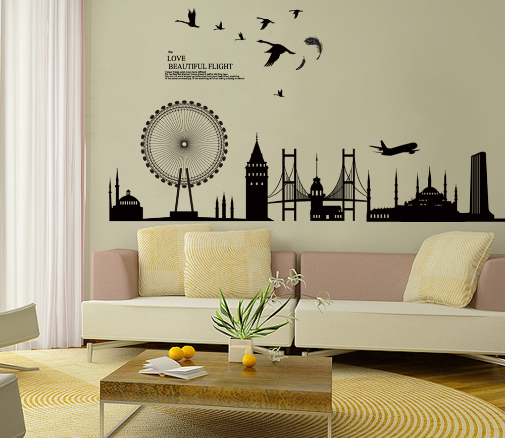 Use adesivos de parede para decorar a sala de estar